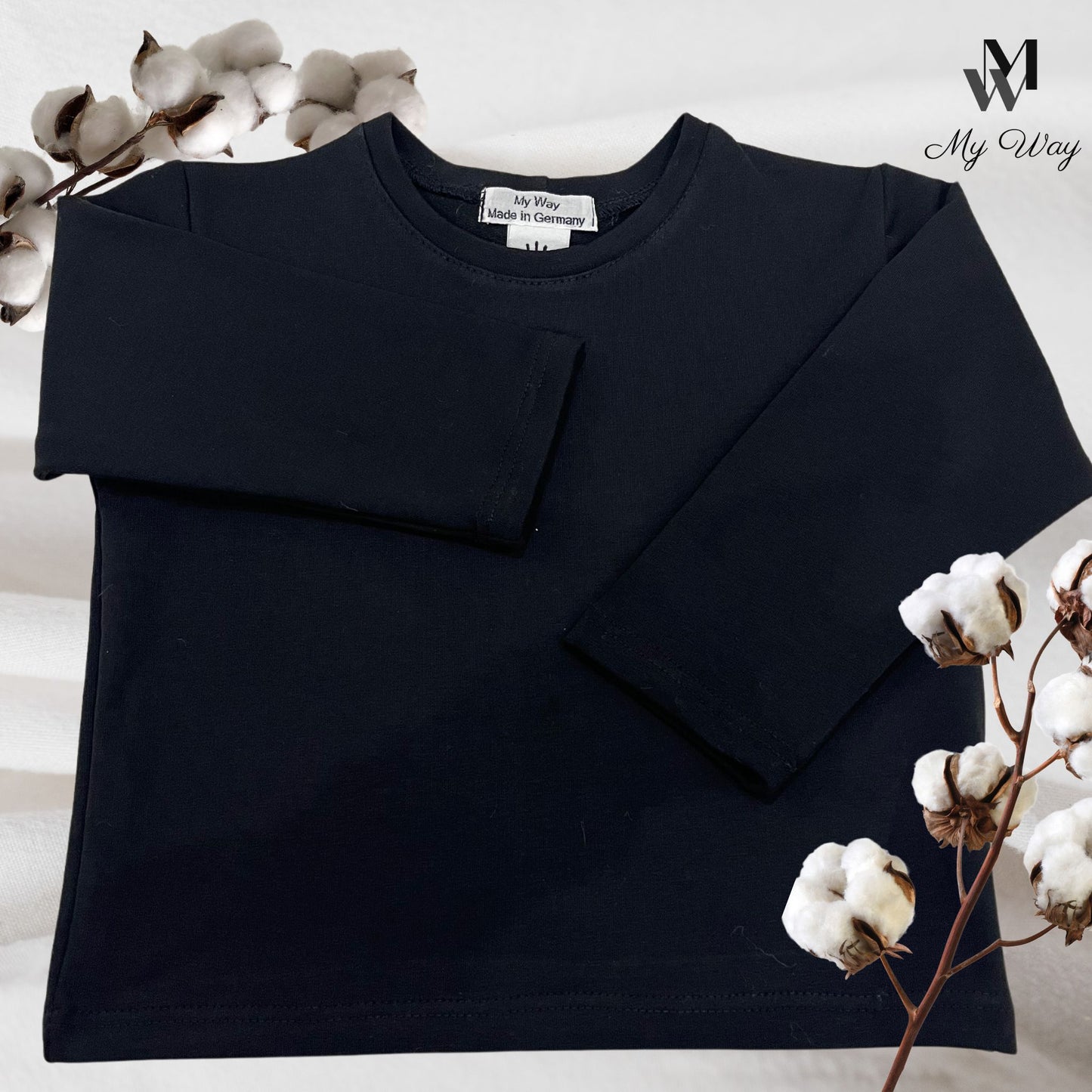 schwarzen Langarm-Shirts aus Bio-Baumwolle für Kinder von My Way D&A. Nachhaltige und hochwertige Mode für Kinder.