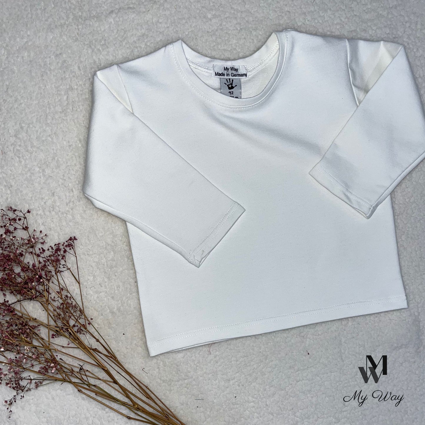 weißen Langarm-Shirts aus Bio-Baumwolle für Kinder von My Way D&A. Nachhaltige und hochwertige Mode für Kinder.