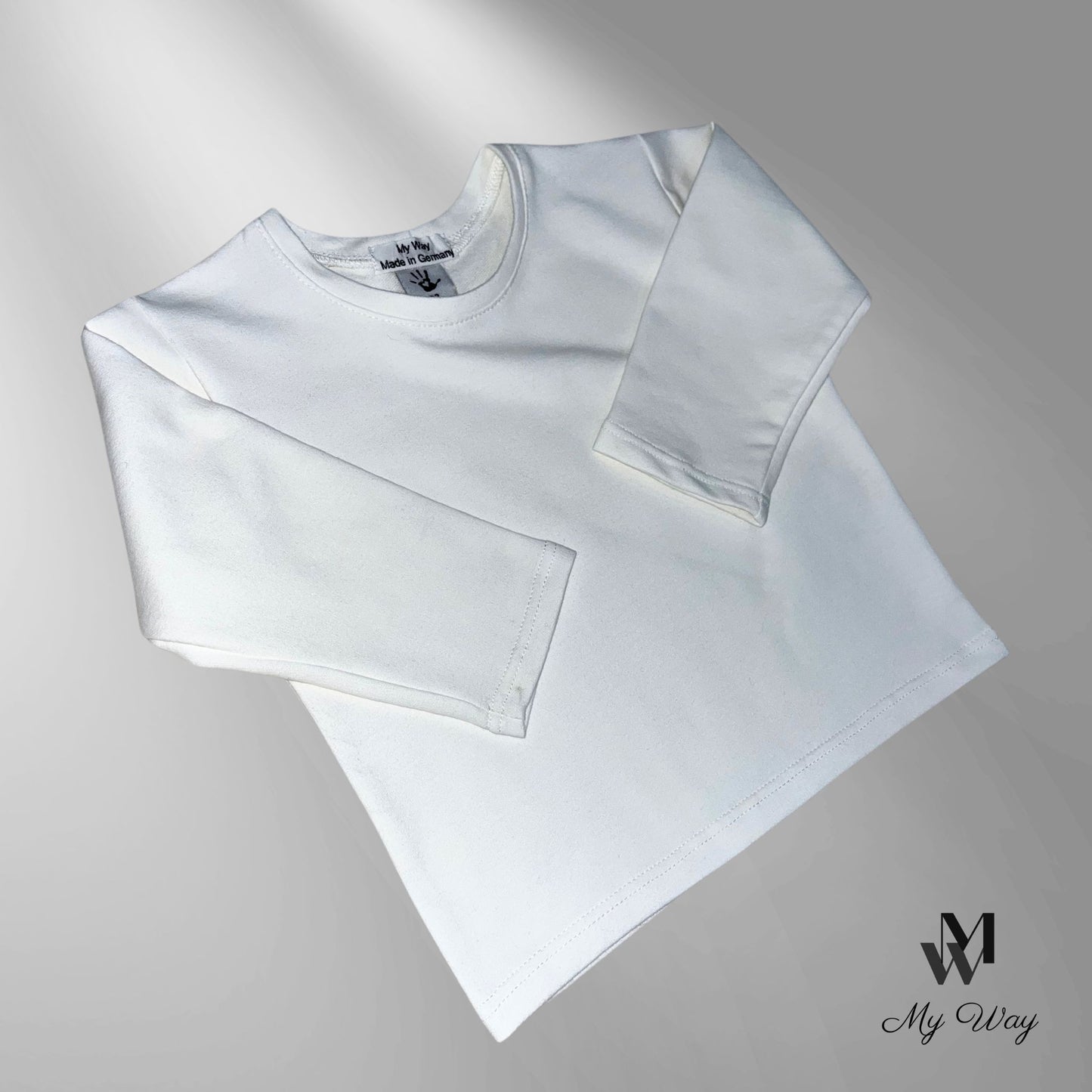 weißen Langarm-Shirts aus Bio-Baumwolle für Kinder von My Way D&A. Nachhaltige und hochwertige Mode für Kinder. bequem