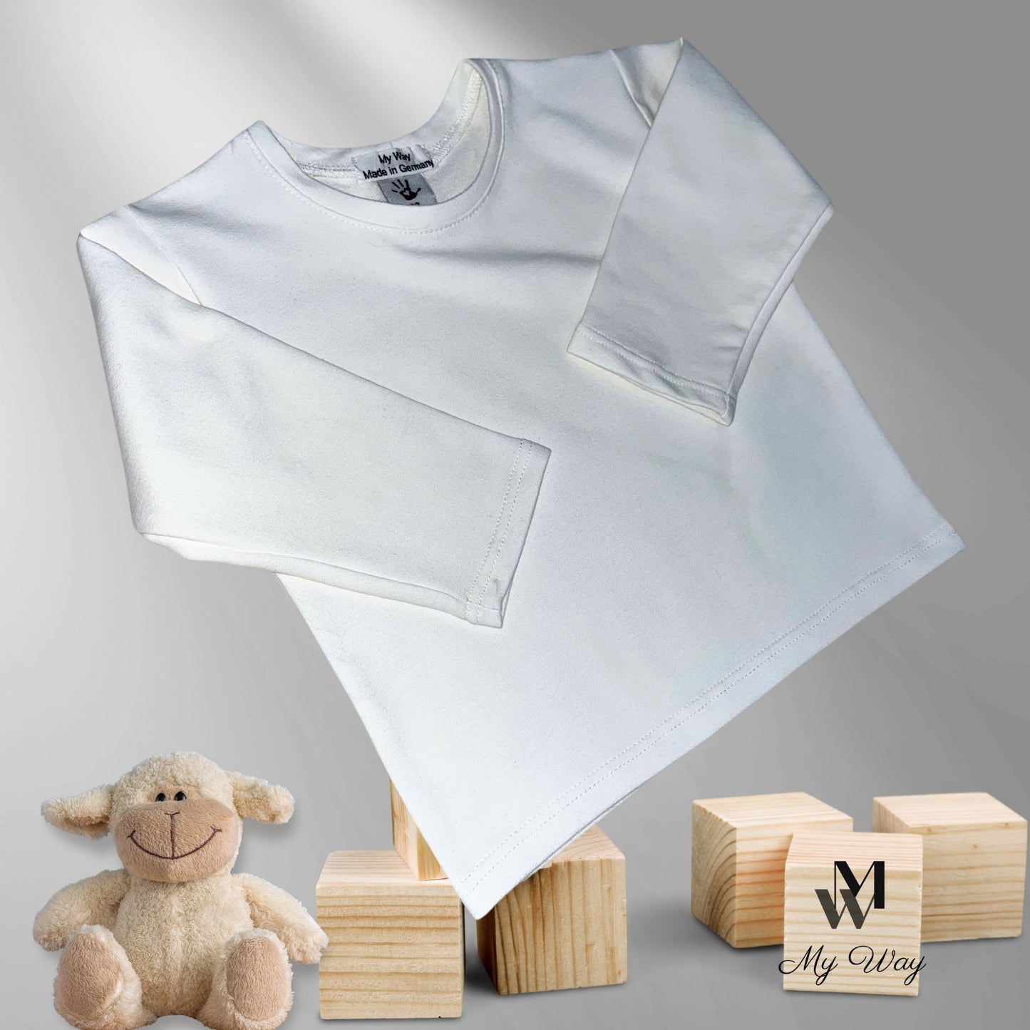 weißen Langarm-Shirts aus Bio-Baumwolle für Kinder von My Way D&A. Nachhaltige und hochwertige Mode für Kinder.